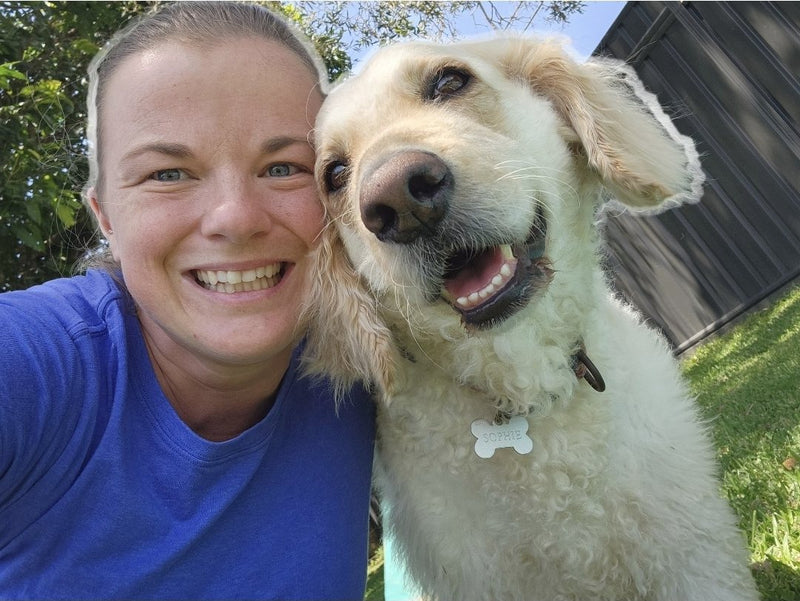 Ros with one of the pack, at home in Lota