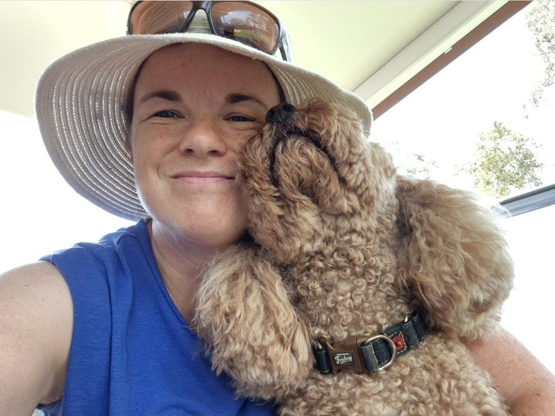 Ros with one of the pack, at home in Lota