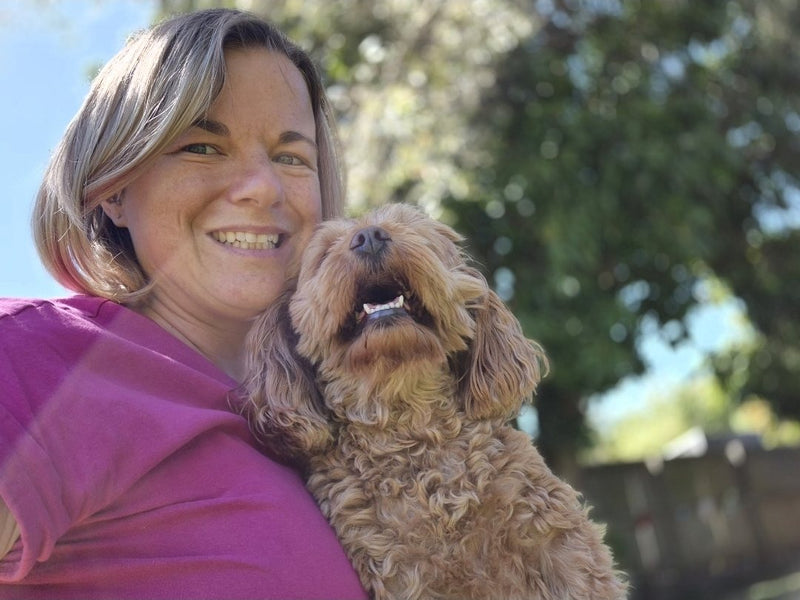 Ros with one of the pack, at home in Lota